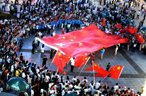 人民日报评论员：不断以中国新发展为世界带来新动力、新机遇