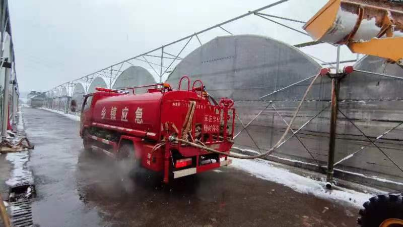 洋市镇：党员民兵齐出动，积极应对冰冻雨雪天气