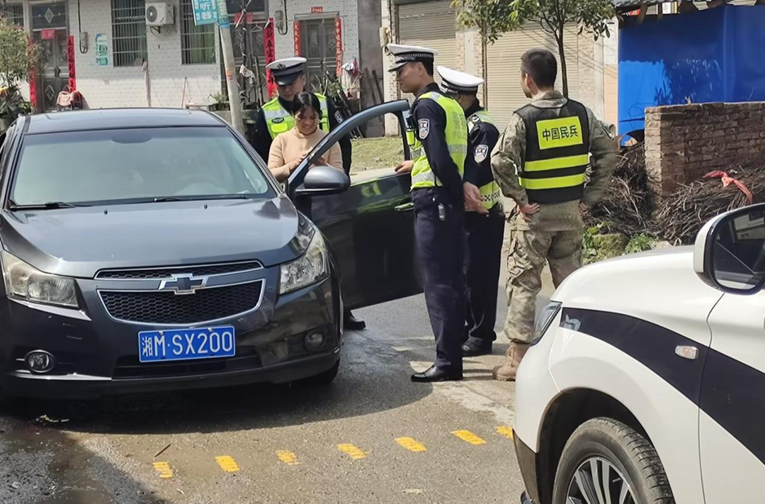 塘市镇：凝聚民兵力量 助力交通安全