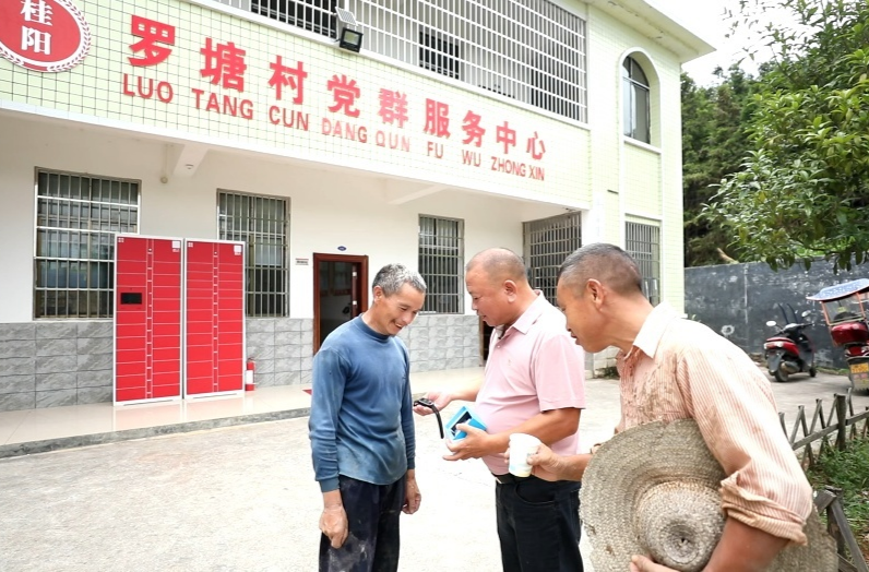 践初心 办实事｜塘市镇：小扇子连民心 定位环护平安